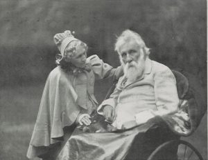 "George MacDonald, 1824 - 1905. Poet and novelist (in a wheelchair) and his Wife Louisa MacDonald (née Powell)" (National Gallery of Scotland)